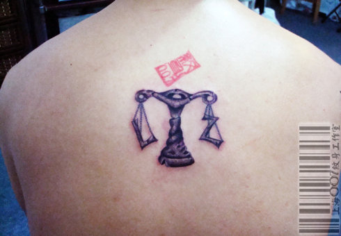 A very cool Libra tattoo design. Notice the L and Z on the two sides of the 