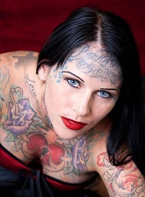 lil wayne tattoo on forehead. Cross Tattoo On Forehead. covered in tattoo artwork