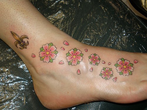 foot tribal tattoos. pretty foot tattoos. pretty