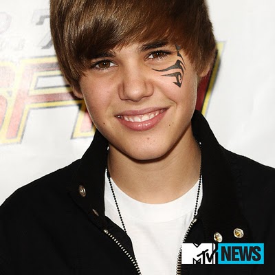 justin bieber tattoo pictures. Justin Bieber Tattoo