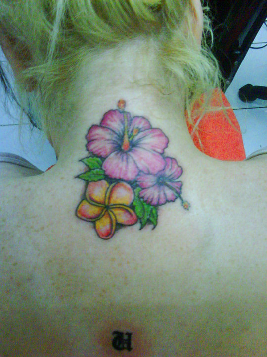flower lower back tattoos for girls